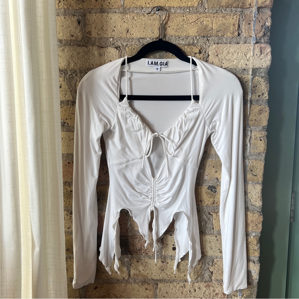 I am gia white tie front long sleeve top